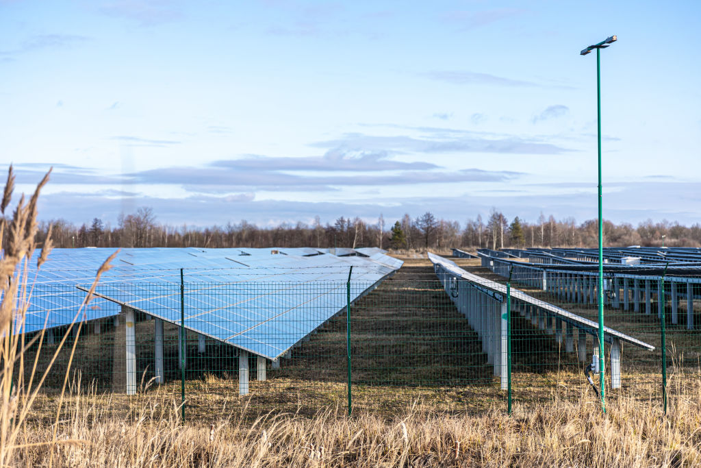 solar farm in a windy landscape